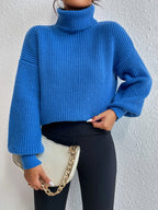 Suéter Feminino de Tricô com Gola Alta e Manga Bufante