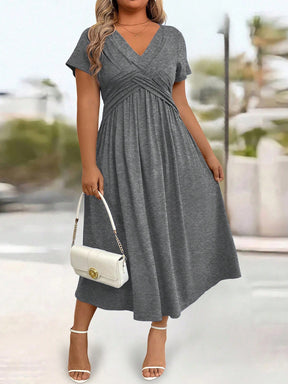 Vestido Plus Size Longo Soltinho Manga Curta com Bolso