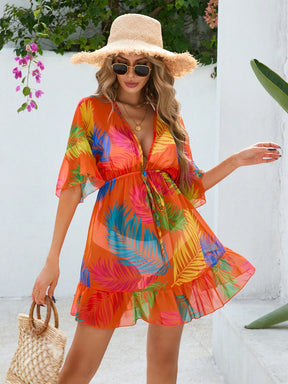 Saída de Praia Vestido Estampa Tropical Manga Morcego