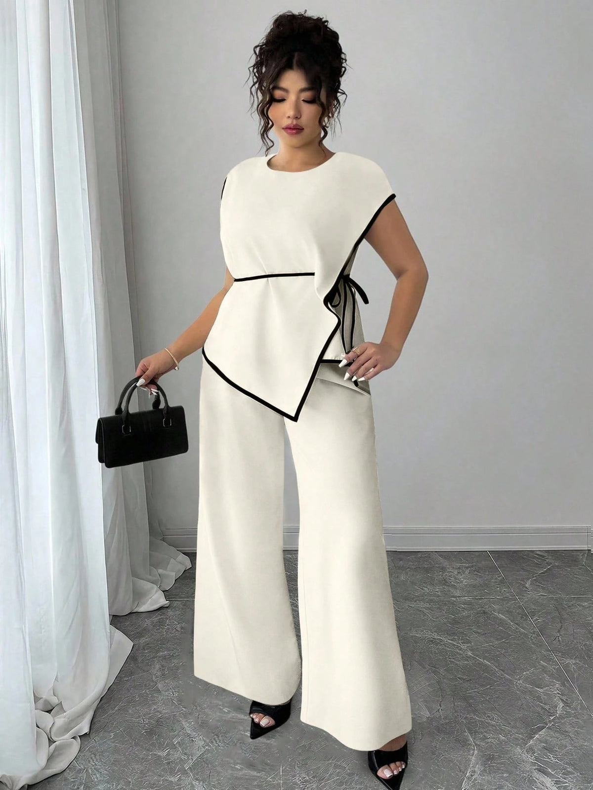 Conjunto Plus Size Alfataria Blusa Assimétrica e Calça Pantalona Acinturado