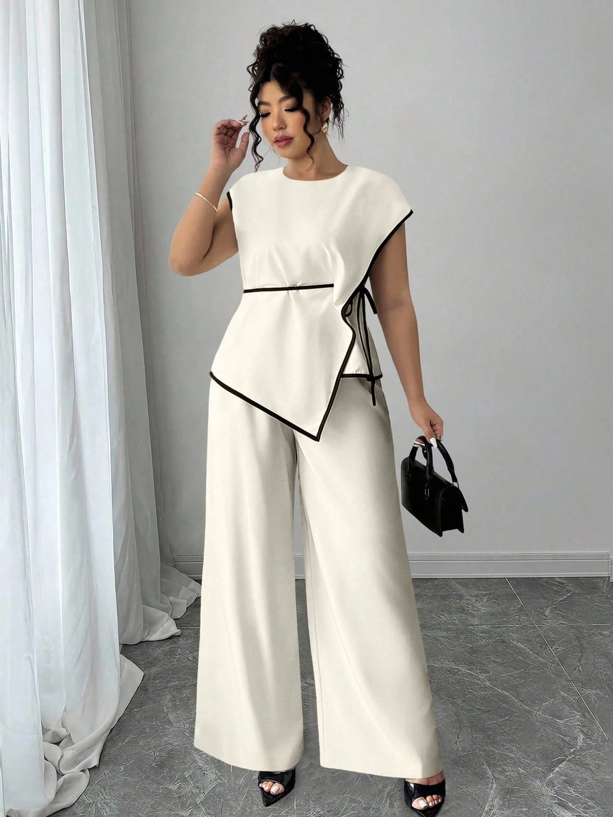 Conjunto Plus Size Alfataria Blusa Assimétrica e Calça Pantalona Acinturado