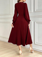 Vestido Midi com Manga Bufante e Cintura Marcada