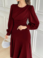 Vestido Midi com Manga Bufante e Cintura Marcada