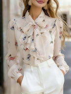 Blusa Feminina Manga Longa com Laço no Pescoço Floral