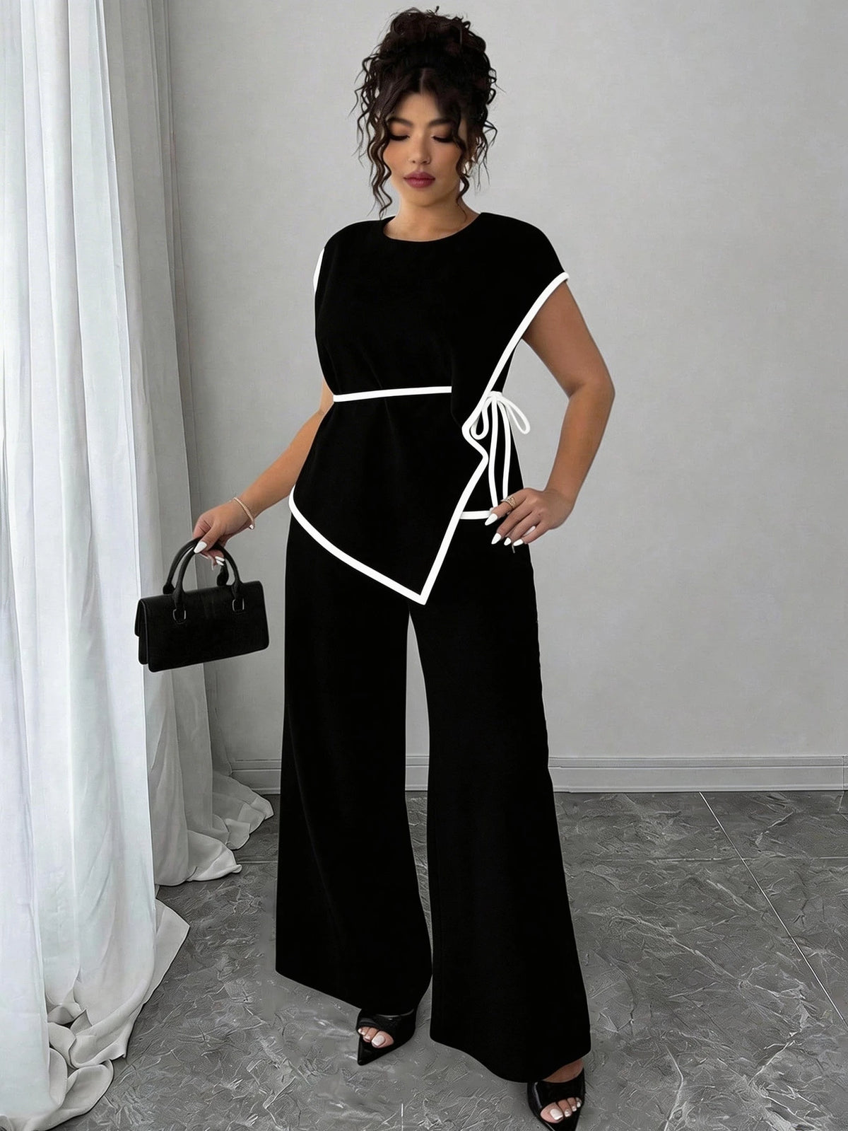 Conjunto Plus Size Alfataria Blusa Assimétrica e Calça Pantalona Acinturado